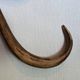 Set of curved wooden coat hooks in Thonet style.