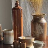 Large antique stoneware bottle with a small cork stopper