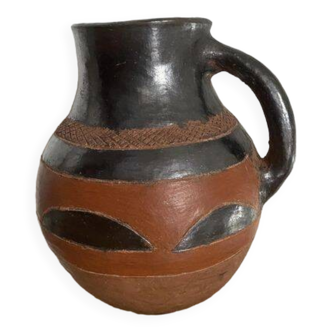 Vase à anse en terre cuite en partie vernissée