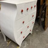 Commode blanche arrondie avec multiples tiroirs