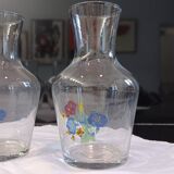 3 glass carafes, vintage. Very pretty floral pattern.