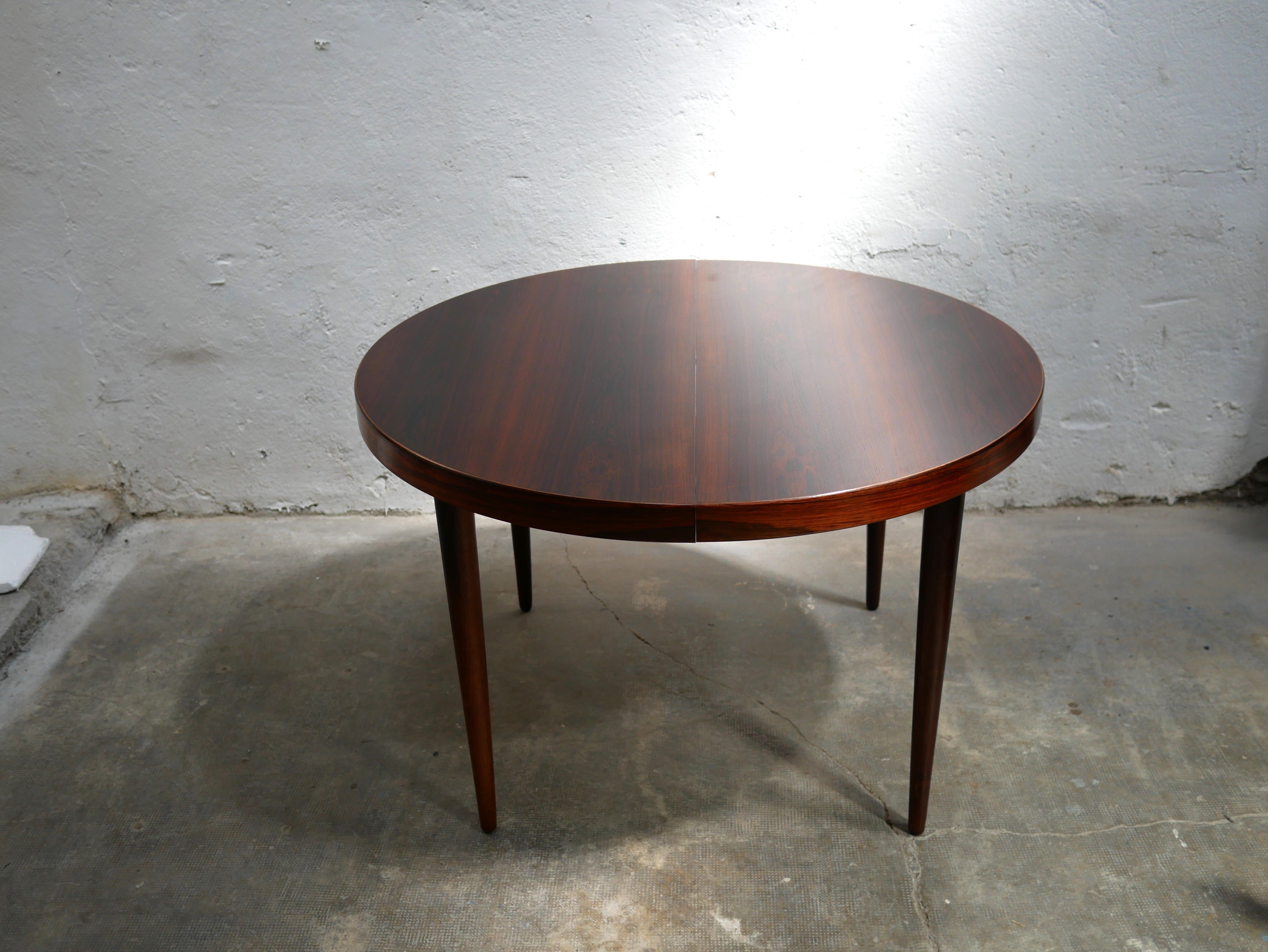 Vintage rosewood extendable Scandinavian round table by Kai Kristiansen for Skovmand and Anders