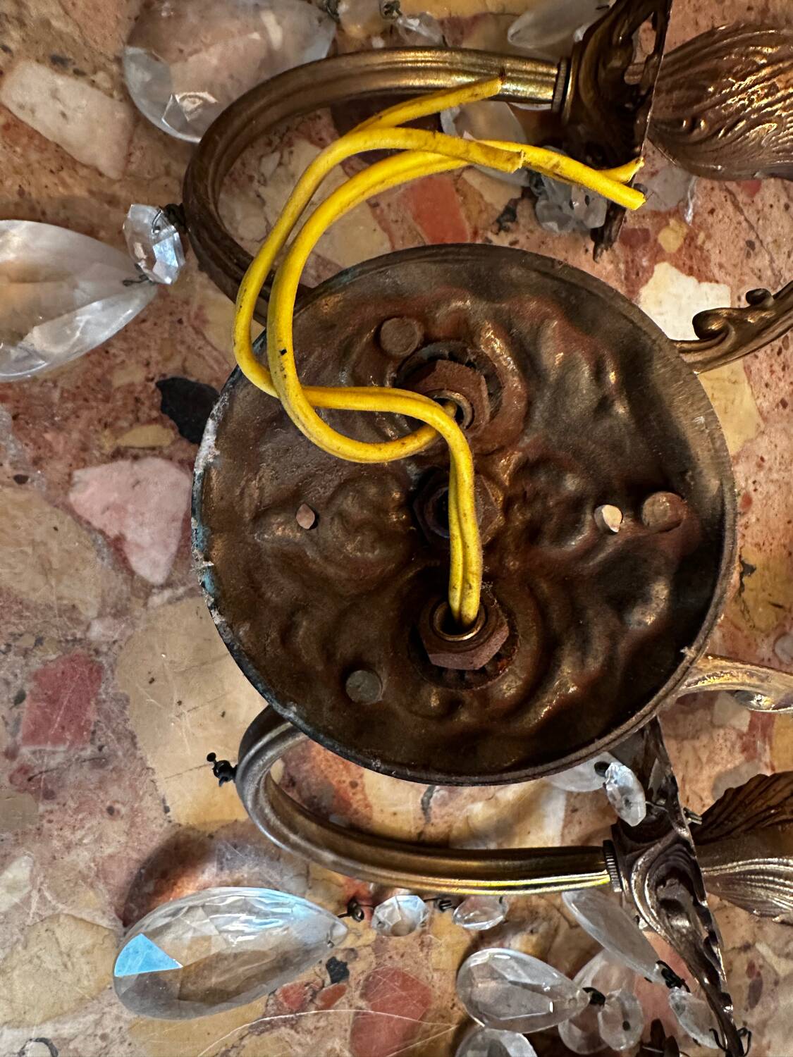 Pair of Louis XV style wall sconces in gilded bronze with glass pendants.