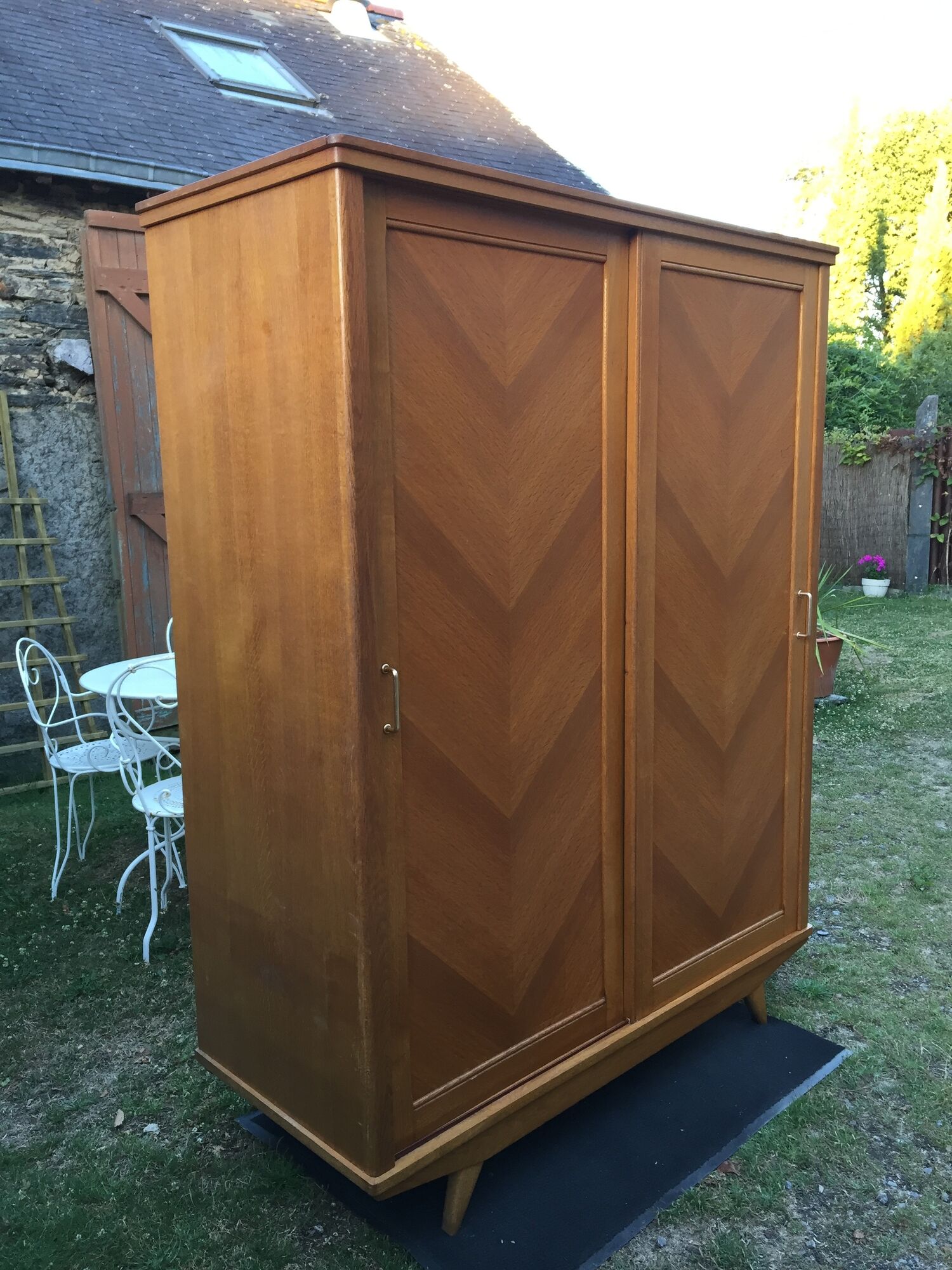 Vintage wardrobe with compass feet in oak and oak cp with 2 sliding doors.