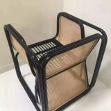 Armchair in black lacquered rattan and natural cane