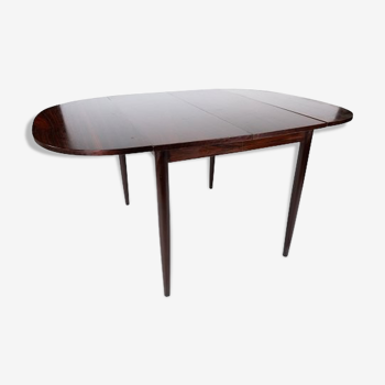 Dining table in rosewood with extensions designed by Arne Vodder from the 1960