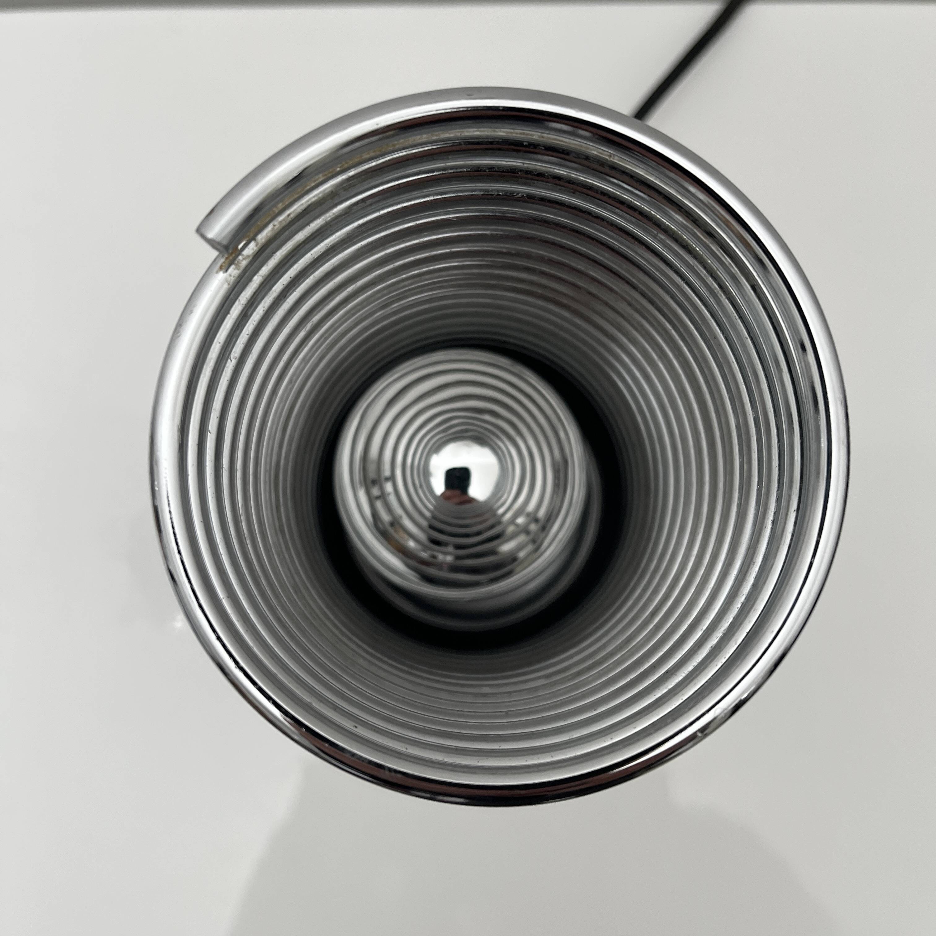 Massive chrome spring lamp