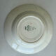 A deep plate in blue and green ironstone, antique French earthenware.