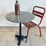 Table bistrot en granit et fonte de fer noire