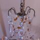 Chandelier to, colored crystal tassels