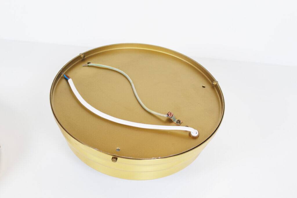 Pair of vintage brass ceiling lights with glass globe