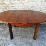 Round table with an extension