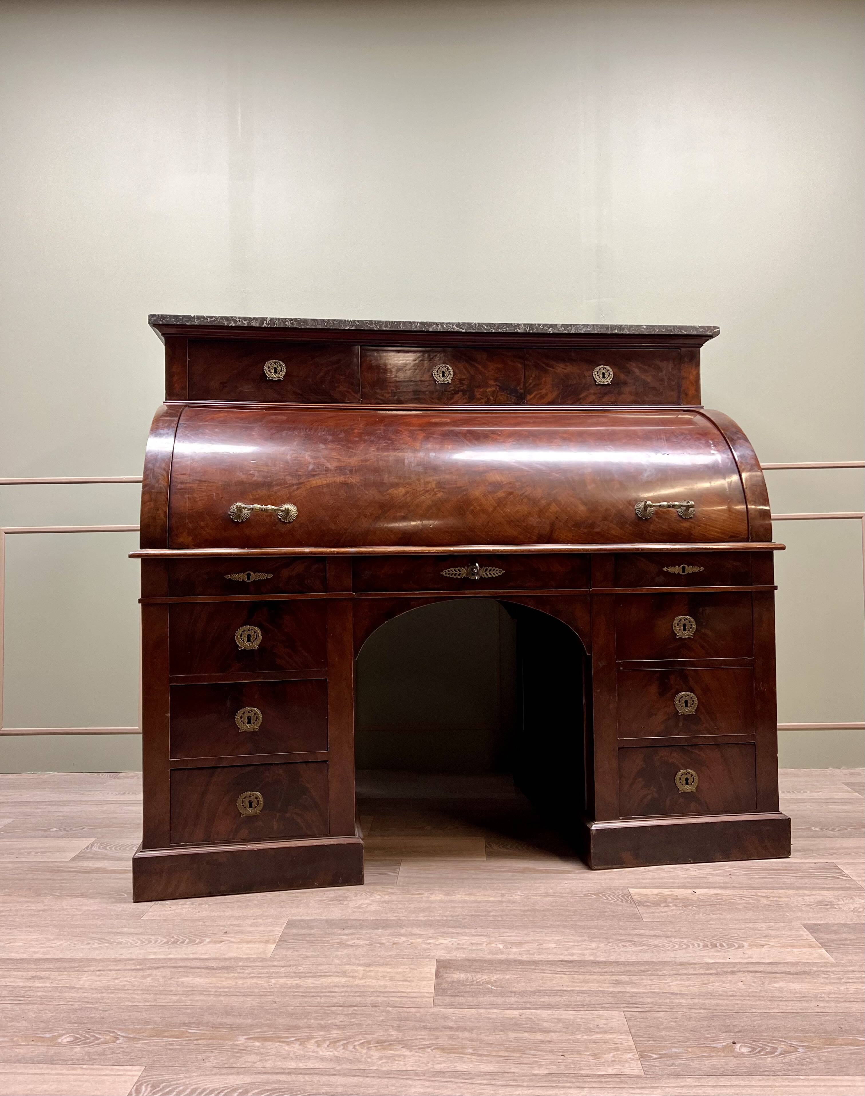 Cylinder desk in flamed mahogany empire style 19th century
