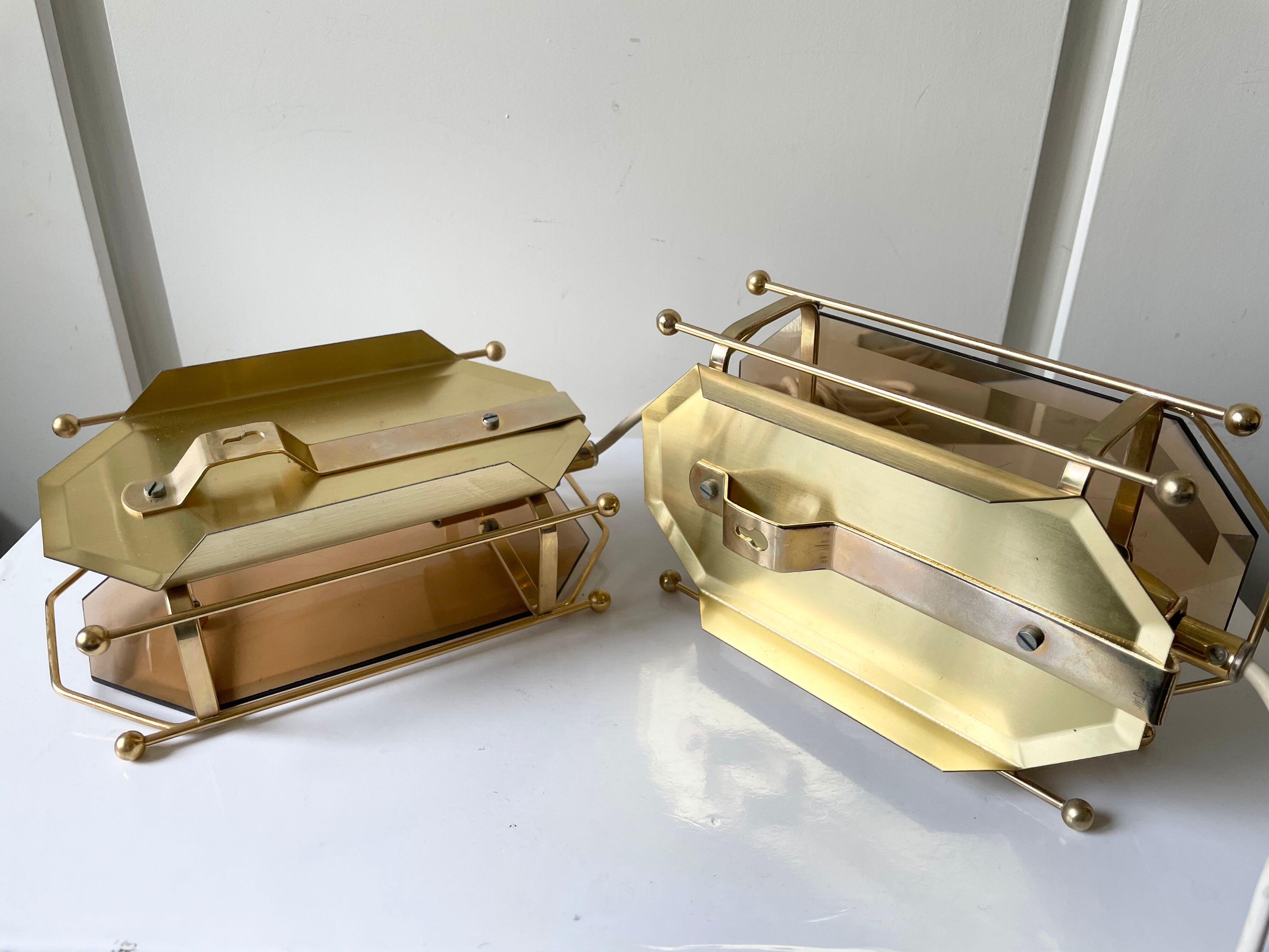 Pair of Scandinavian Vintage  wall light Sconce in Brass & Amber colored Glass