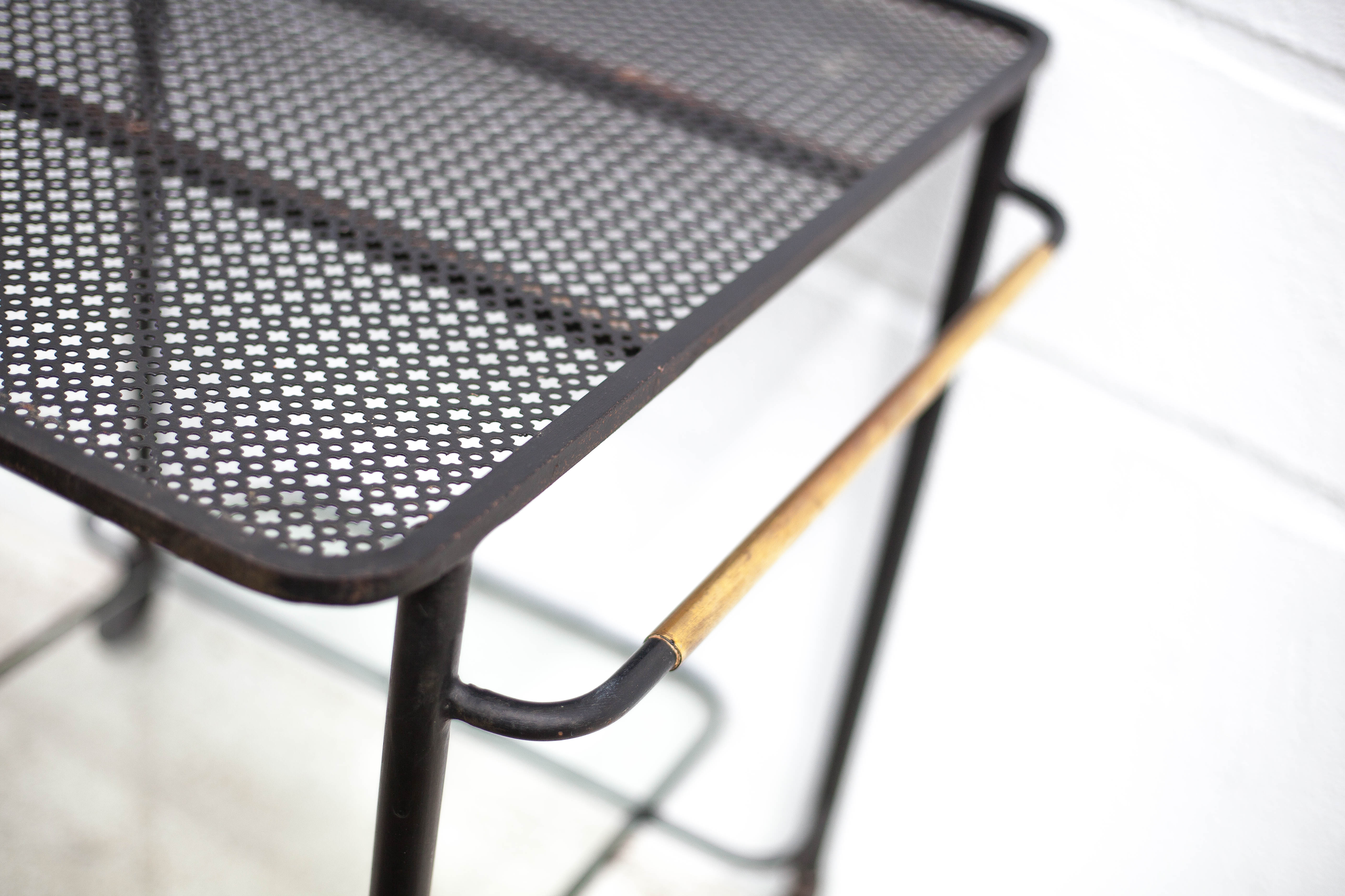 Mathieu Matégot rolling table, steel and brass service, 50s