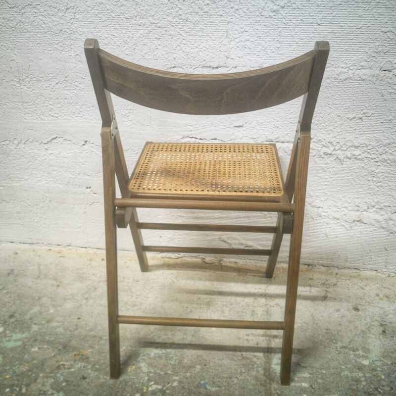 Folding chair with canned seat