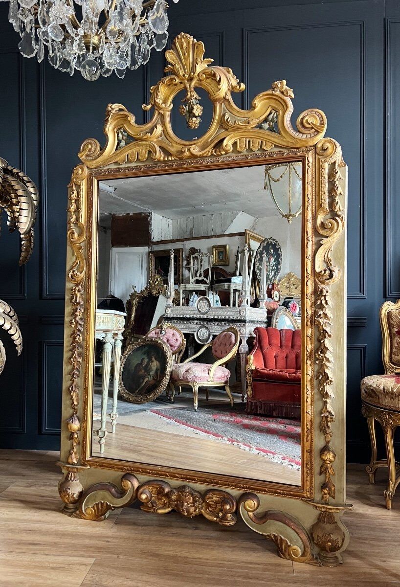 Italian mirror from the Napoleon III period in painted and gilded wood