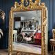Italian mirror from the Napoleon III period in painted and gilded wood