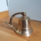 Wall entrance bell with bracket