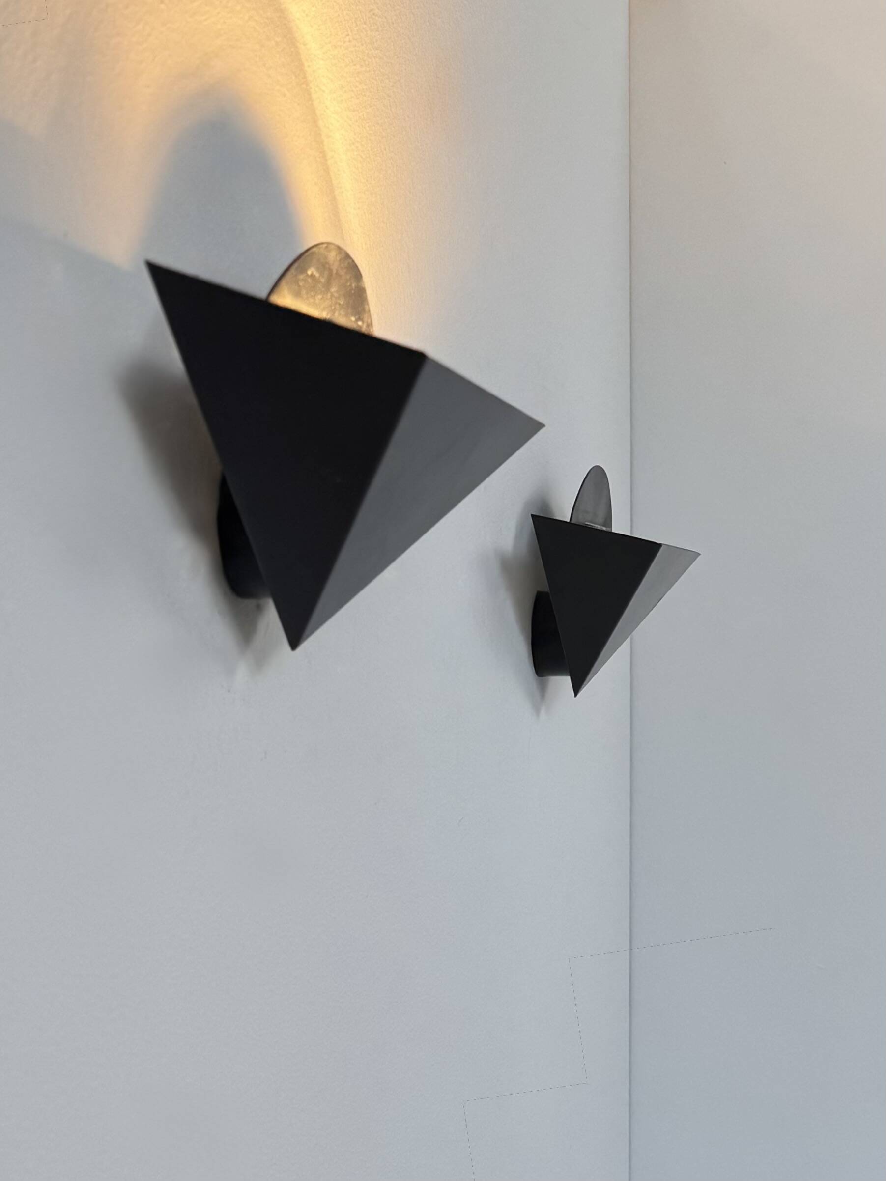 Pair of vintage wall sconces, matte black metal, France, 1970.