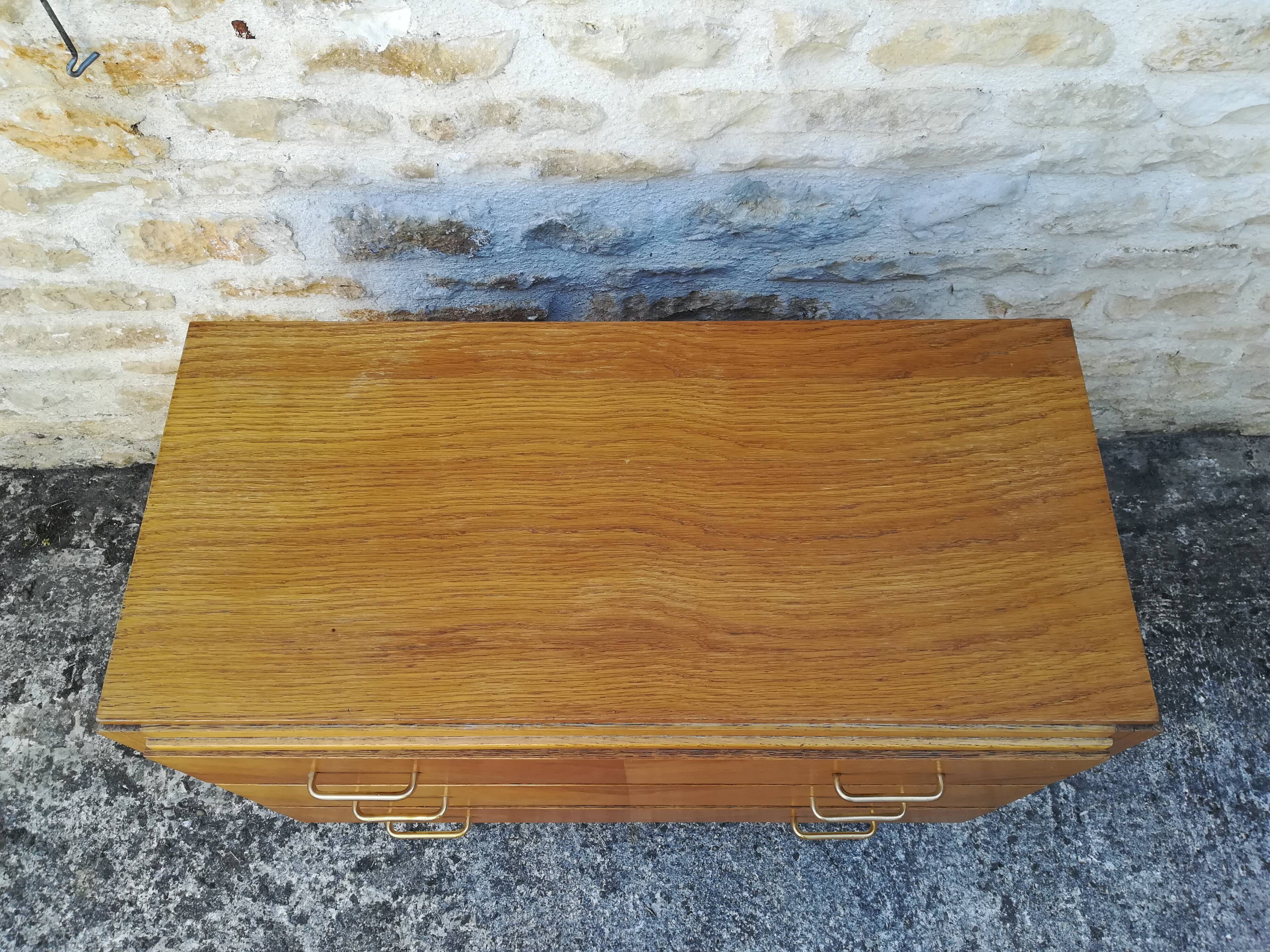 Compass feet chest of drawers