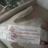 Lot de 2 appliques Coquecigrues en métal patiné