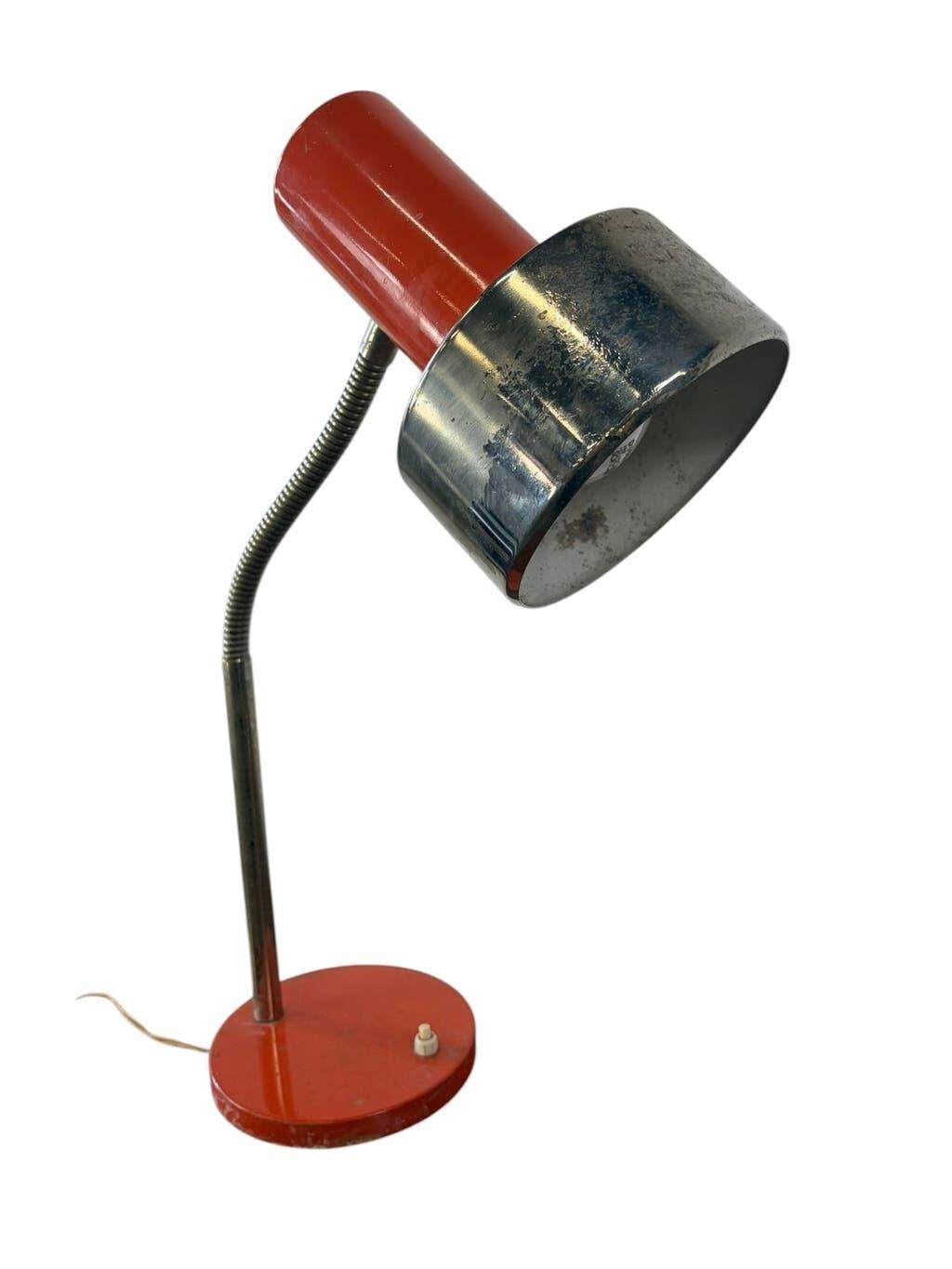 Vintage orange desk lamp with chrome accents.