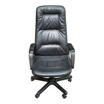 Vintage black leather executive or presidential office chair from 1990.