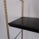 Metal string shelf