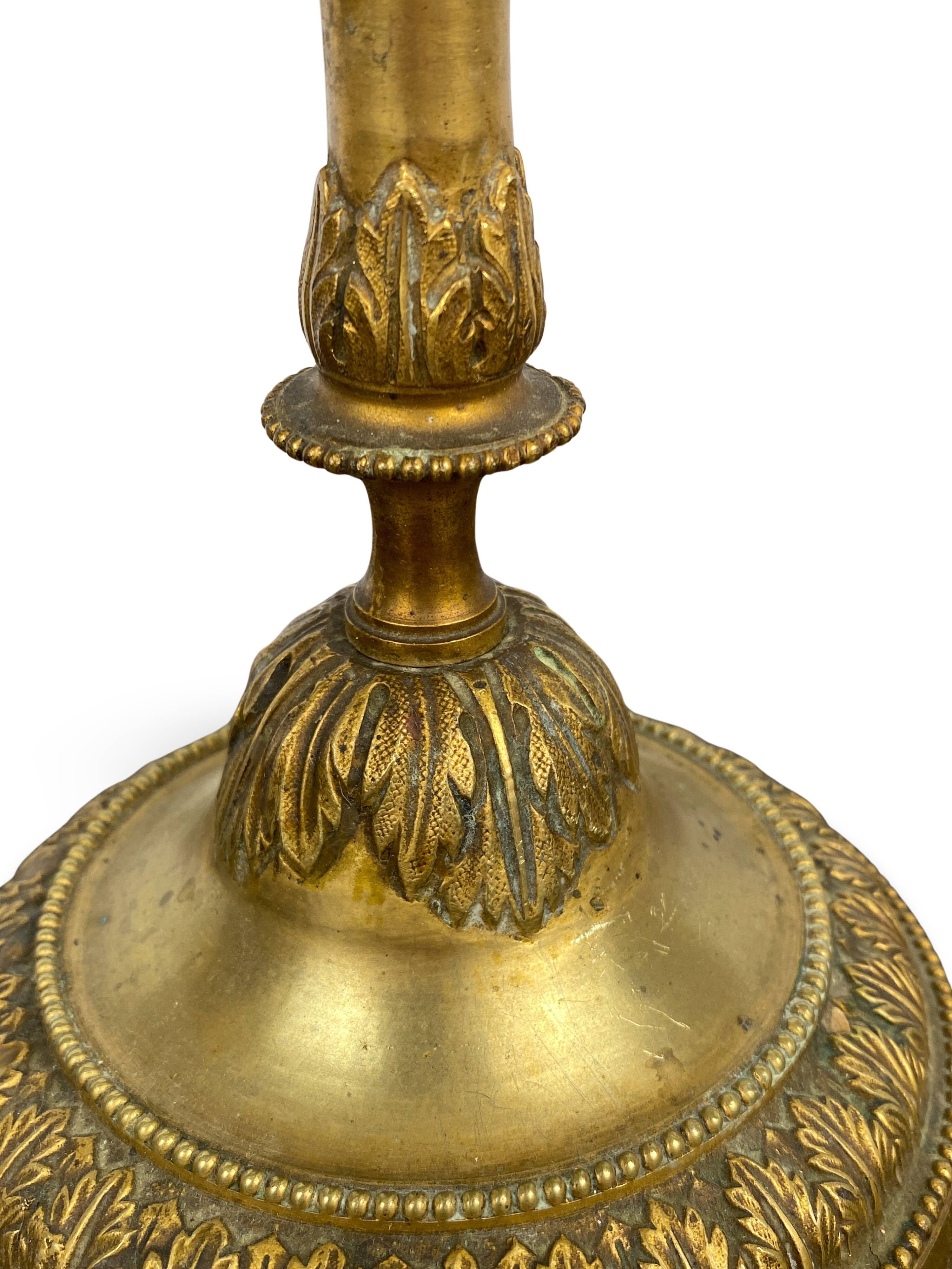 Louis XVI period candlestick in chiseled gilt bronze