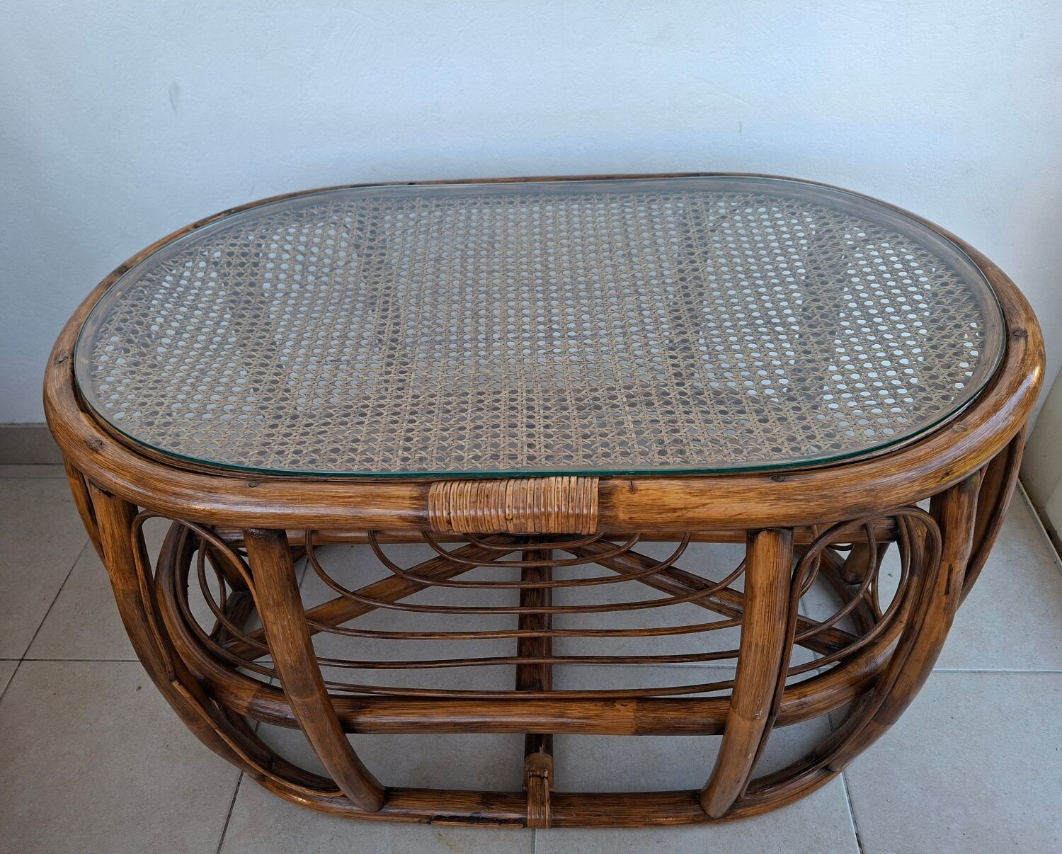 Oval coffee table in rattan and cane, vintage double top.