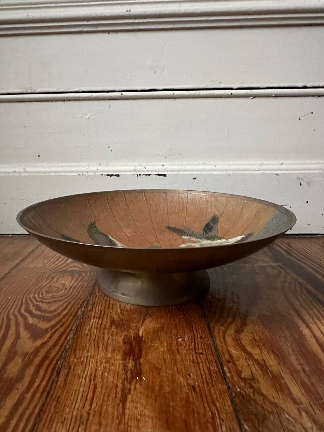 Enameled brass pocket emptier