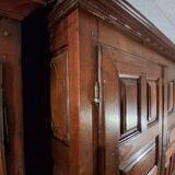 18th-century wardrobe, in walnut, minimalist style.