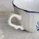 Antique Lancaster cup in white earthenware with blue decoration