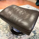 2-seater Stressless sofa with its footrest.
