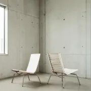 Set of 2 Crossed Legged lounge chairs by Fabiaan van Severen.