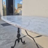 Antique cast iron and marble bistro restaurant table