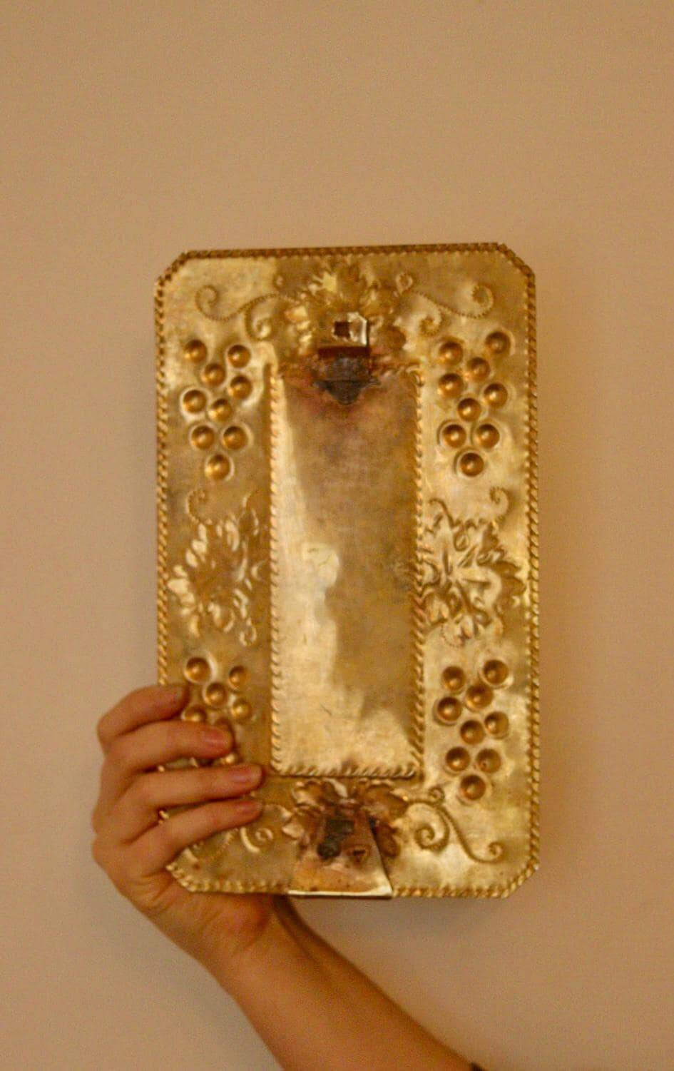A pair of Swedish brass wall sconces from the mid-century.