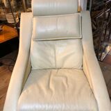 White leather armchair and ottoman