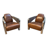 Set of 3 Stacyville items, leather and stainless steel, 2 armchairs and a sofa.