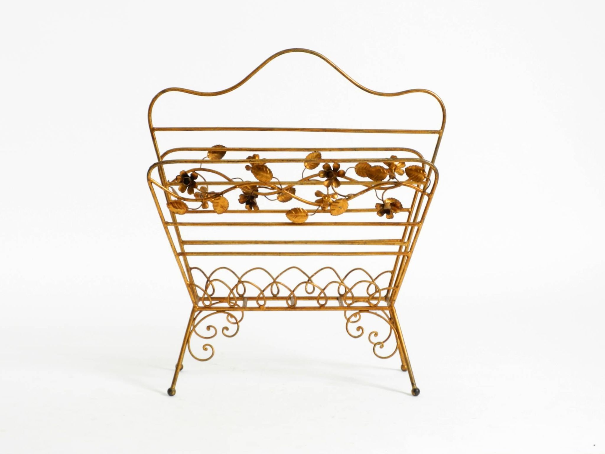 Extraordinary mid-century newspaper and magazine rack with a gilded metal