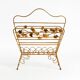 Extraordinary mid-century newspaper and magazine rack with a gilded metal