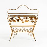 Extraordinary mid-century newspaper and magazine rack with a gilded metal