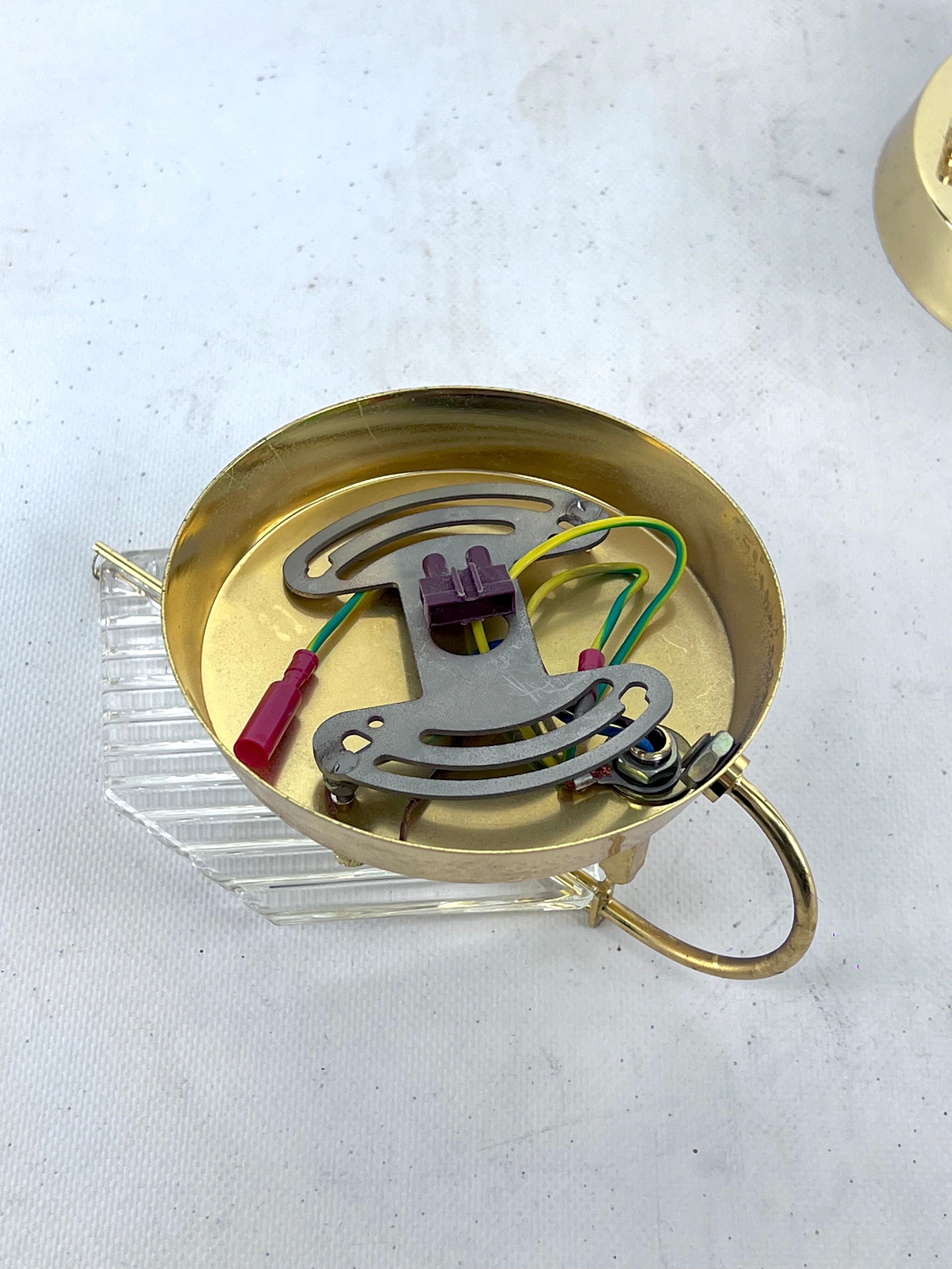 Vintage set of three sconces in brass and glass by Zero Quattro. Italy 1970s