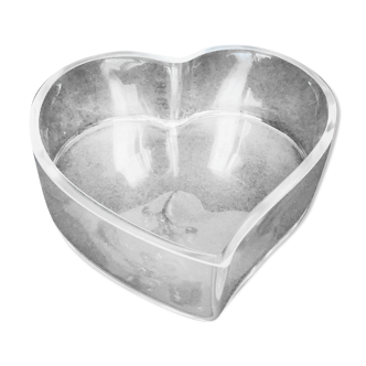 Empty glass heart-shaped pocket