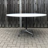 Round dining table by Charles & Ray Eames for Vitra 1980