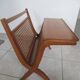 Cane magazine rack with light wood shelf