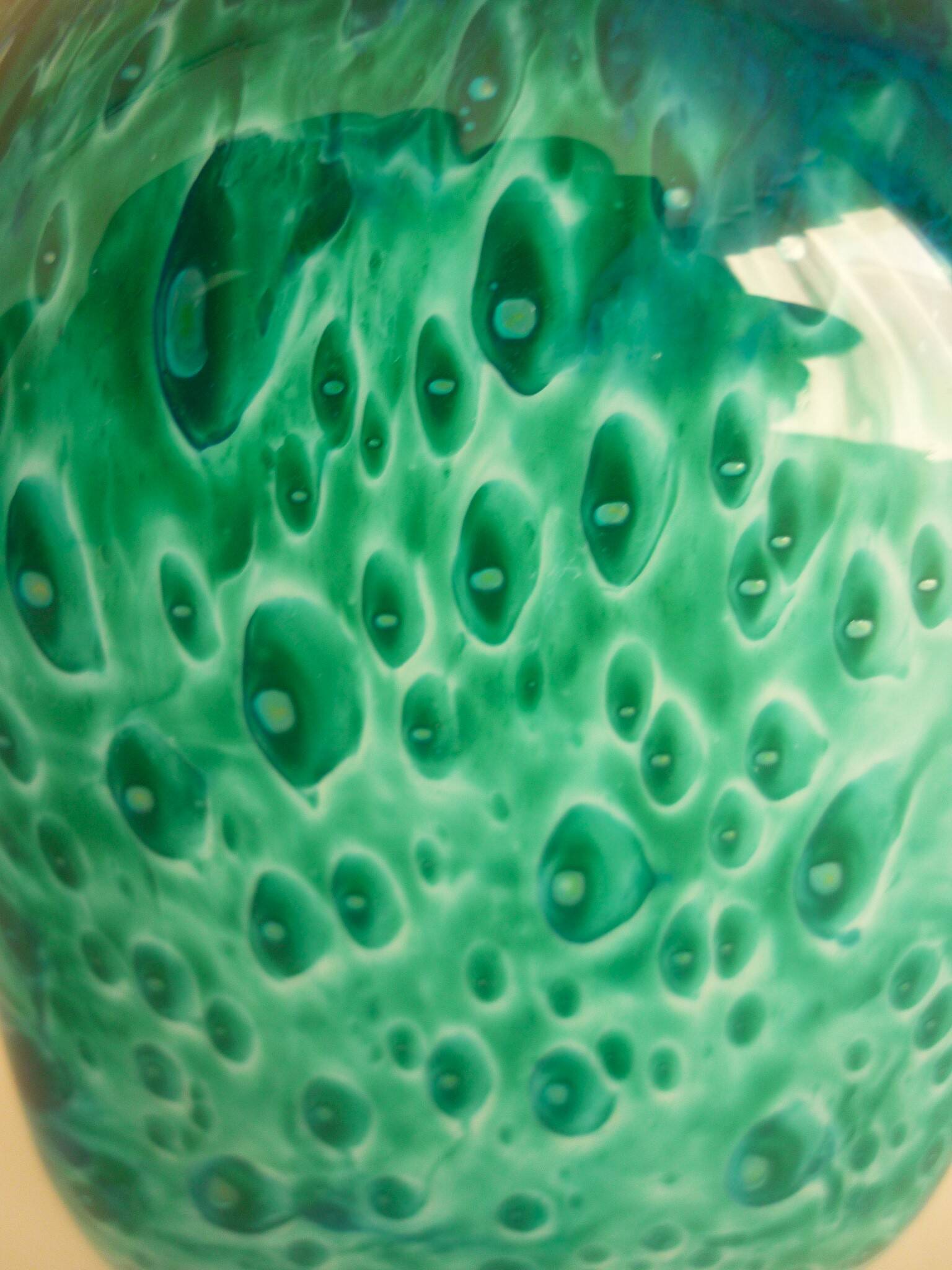 White multi-layer blown glass bottle vase with blue and green inclusions