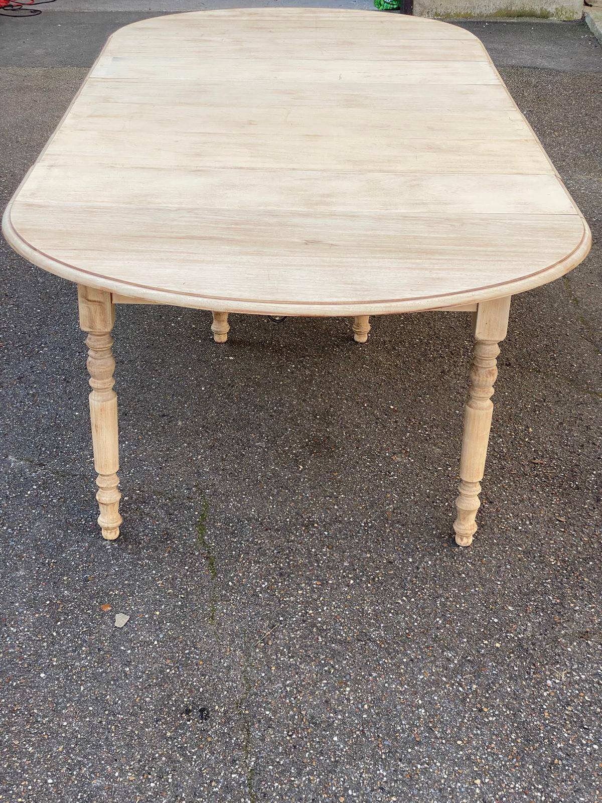 Renovated round extendable dining table with flaps, 6 extensions, 300cm.