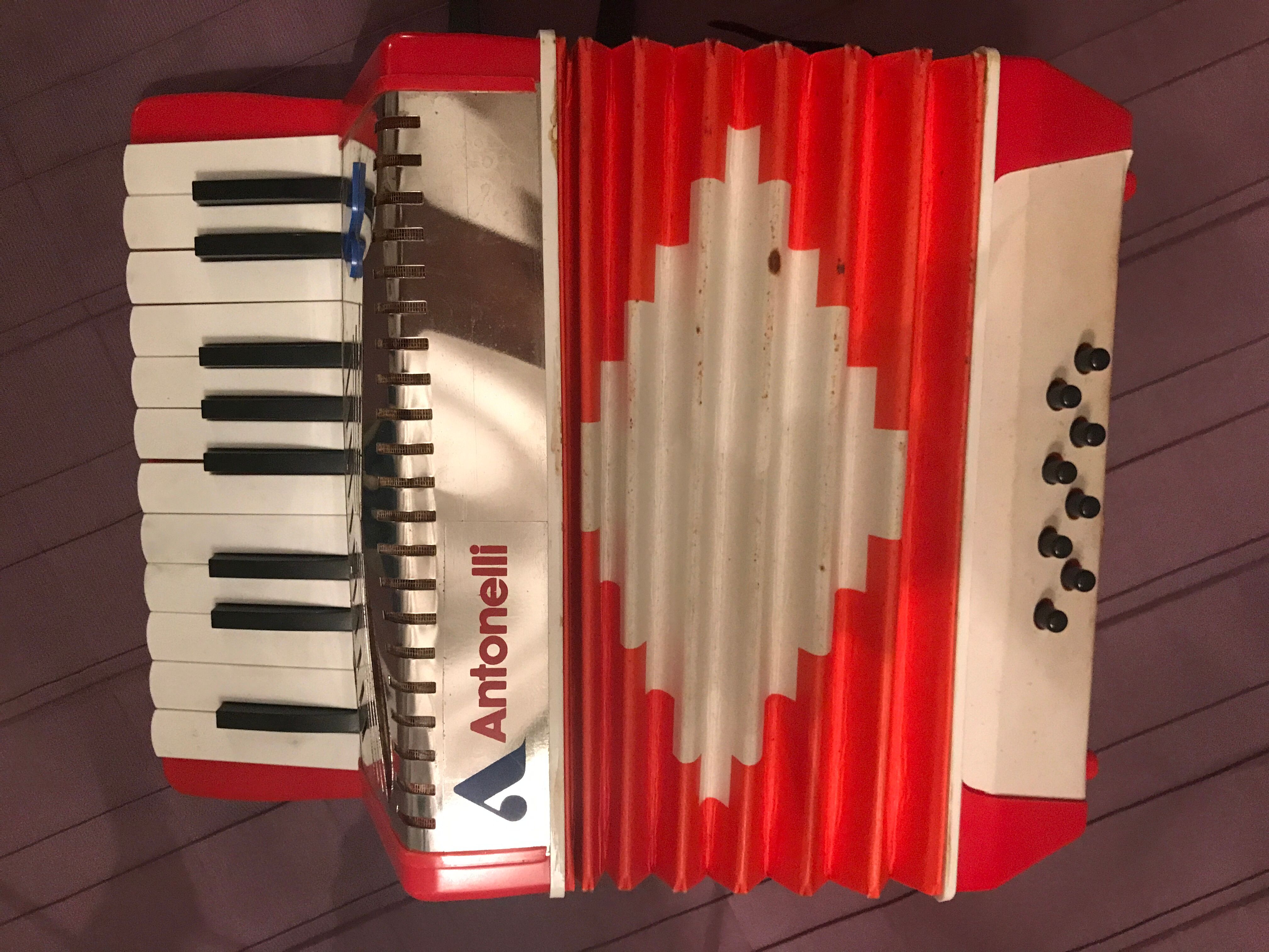Accordion former red vintage Kids Toy mark Antonelli